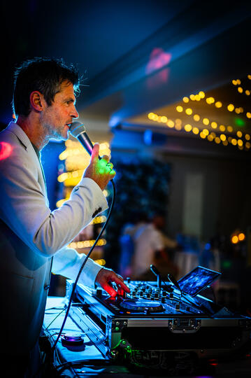 Carl Ward DJing live on the decks in Guernsey, professional photography by Nick Despres.