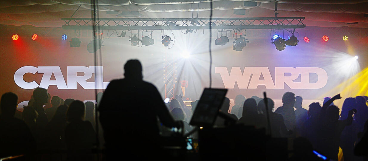 Carl Ward performing a live retro Eighties Explosion theme DJ set at Beau Sejour Leisure Centre in Guernsey.